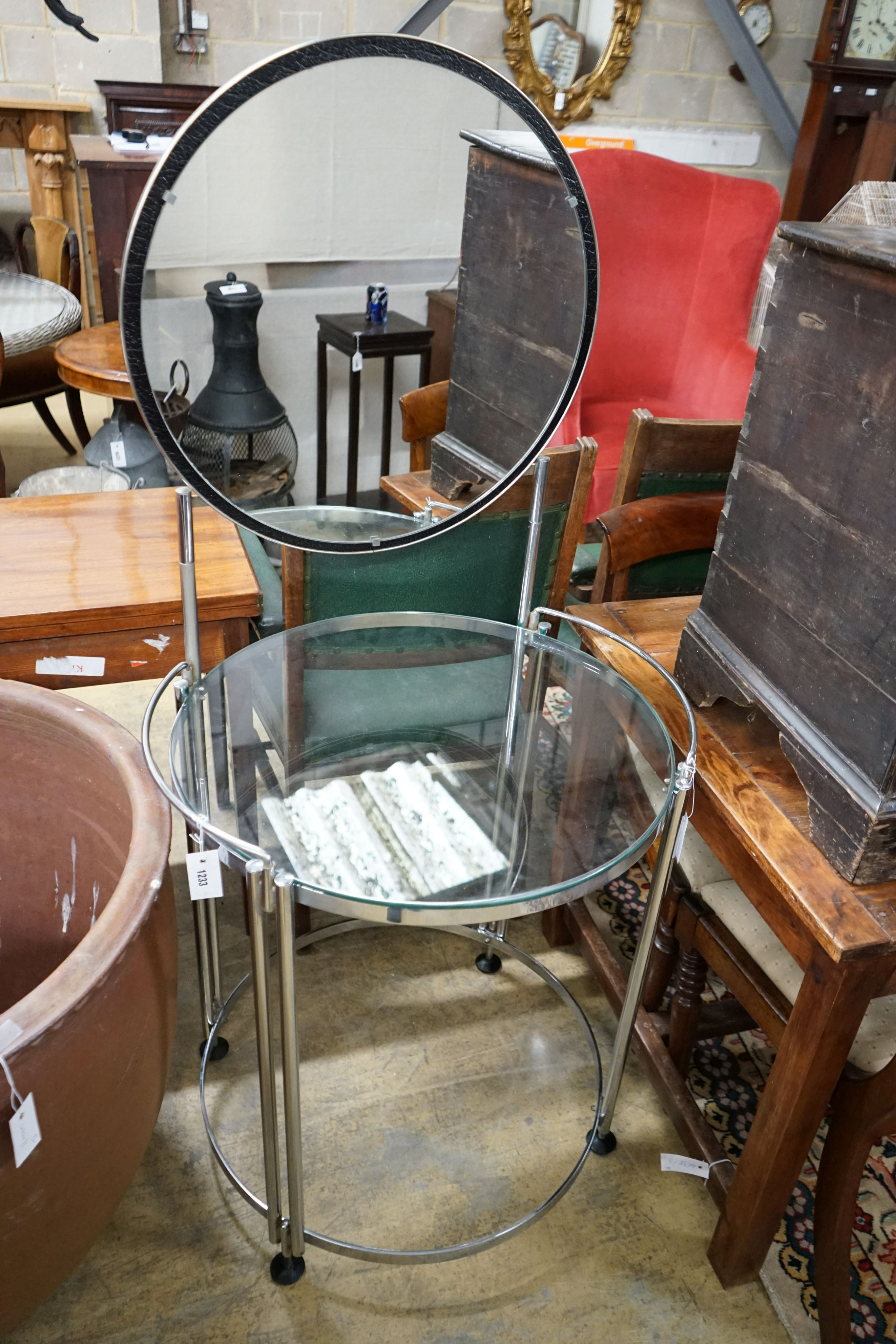An Art Deco style chrome and glass circular dressing table, diameter 71cm, height 152cm